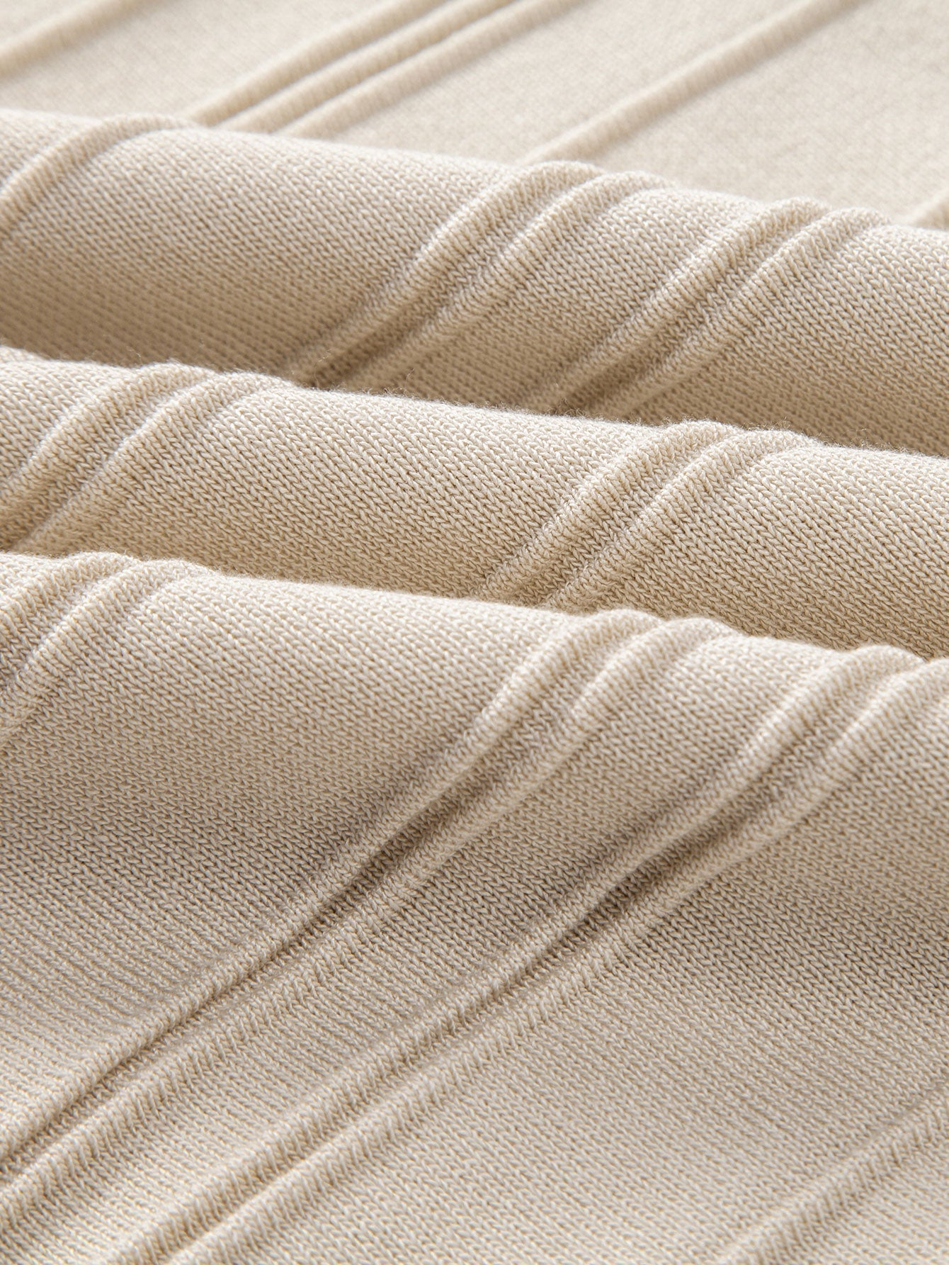 Polo de punto jacquard a rayas con cremallera